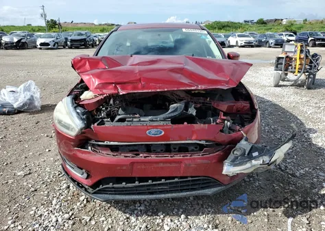 2016 Ford Focus Titanium z USA, uszkodzony, nr VIN 1FADP3N2XGL407427